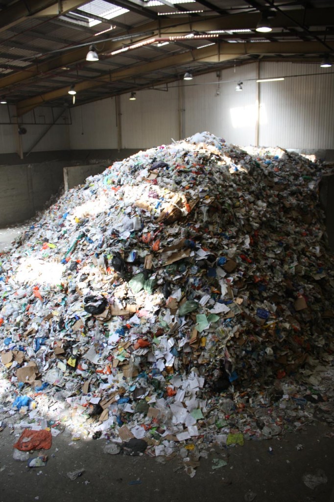 Recycling pile at one end of Greenwich MRF