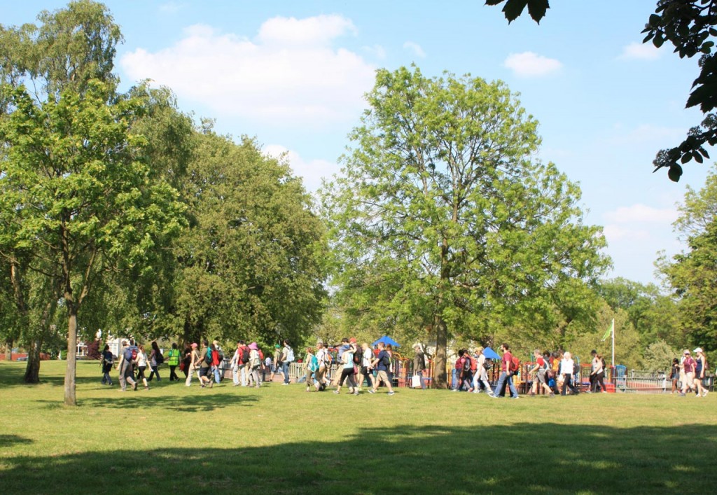 Ian Bull leads Green Chain walkers cross Eaglesfield Park