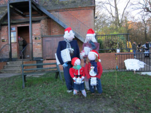 Father Christmas' scarecrow helpers